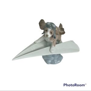 Lladro #6665 Let's Fly Away Dog On Paper Airplane